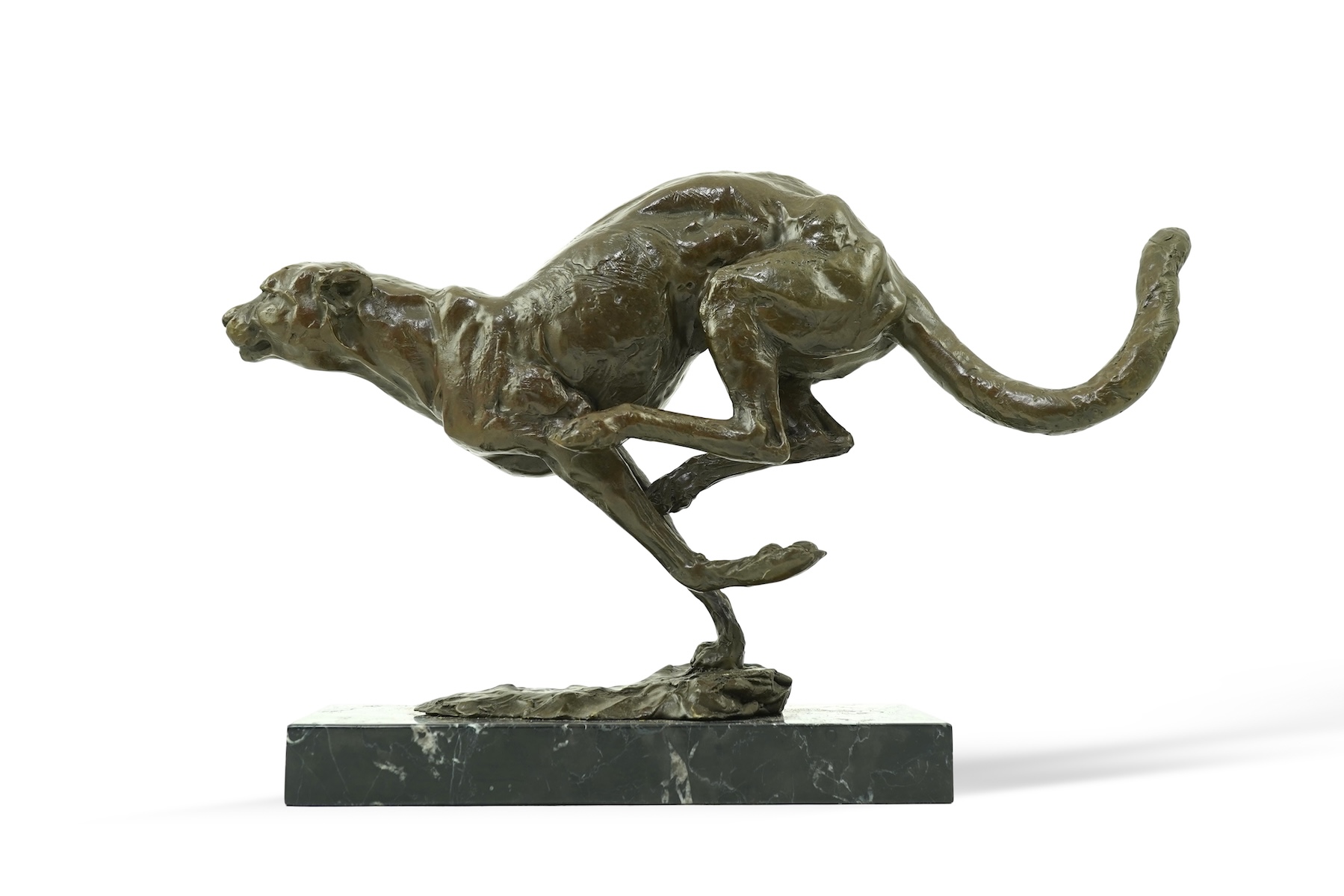 Manner of Mark Coreth (b. 1958): A patinated bronze model of a cheetah in full flight